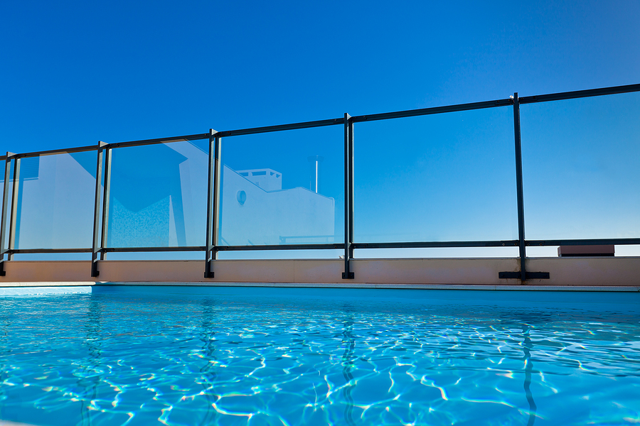 Apartment house with outdoor swimming pool at the roof. Horizontal shot