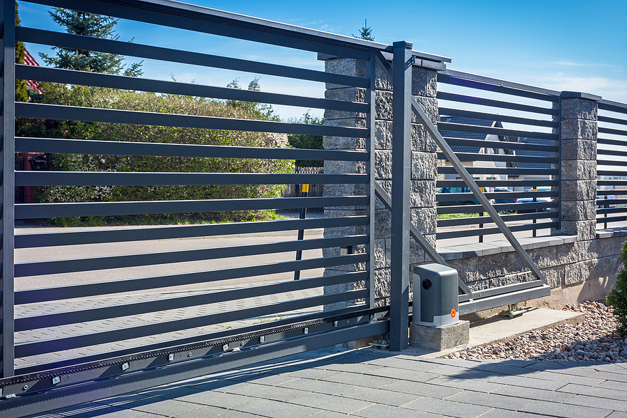 Stone fence and entrance gate with remote control